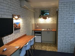 Köök või kööginurk majutusasutuses Culcairn Motor Inn