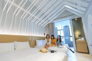 Katil atau katil-katil dalam bilik di HOTEL PIN Jiaoxi