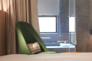 Katil atau katil-katil dalam bilik di HOTEL PIN Jiaoxi