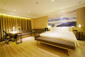 Postel nebo postele na pokoji v ubytování Atour Hotel Guangzhou Yueqiao Branch