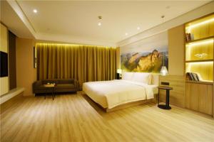 Postel nebo postele na pokoji v ubytování Atour Hotel Guangzhou Yueqiao Branch
