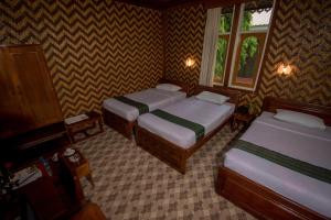 Katil atau katil-katil dalam bilik di Ruby True Hotel