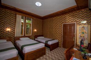 Katil atau katil-katil dalam bilik di Ruby True Hotel