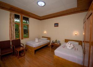 Katil atau katil-katil dalam bilik di Ruby True Hotel