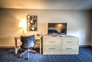 a room with a desk and a chair at Best Western Plus Media Center Inn & Suites in Burbank