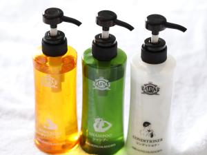 a group of three bottles sitting next to each other at APA Hotel & Resort Yokohama Bay Tower in Yokohama
