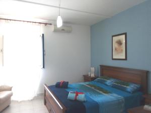 Кровать или кровати в номере Spruzzi di Sale