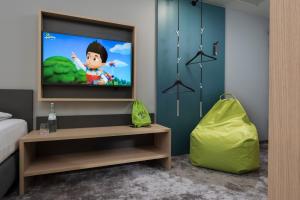 TV/trung tâm giải trí tại ibis Styles Stuttgart Vaihingen