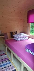 Postel nebo postele na pokoji v ubytování Camping Jaunzāģeri