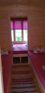 Postel nebo postele na pokoji v ubytování Camping Jaunzāģeri