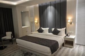 Krevet ili kreveti u jedinici u okviru objekta Hotel Radiance
