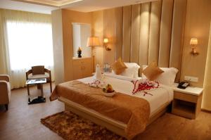 Krevet ili kreveti u jedinici u okviru objekta Hotel Radiance