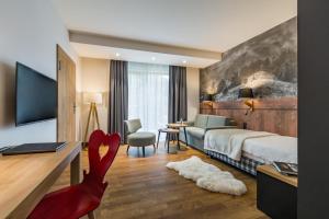 Szczawnica Park Resort & Spa的电视和/或娱乐中心