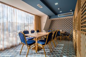 Posezení v ubytování Gladius Inn Boutique Hotel by DNT Group + 37 fotografií