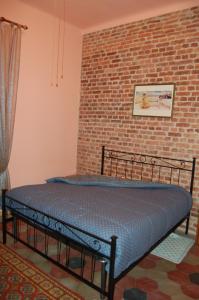 A bed or beds in a room at Laghi d'Insubria