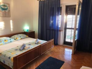 Ein Bett oder Betten in einem Zimmer der Unterkunft Apartment DAZ
