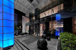 a lobby of a building with blue lights at Pan Pacific Xiamen(Near the Ferry to Gulang Island and Metro Station) in Xiamen