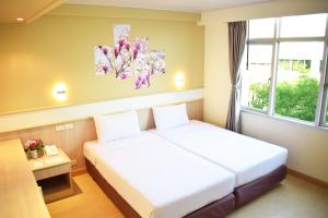 Postel nebo postele na pokoji v ubytování Trang Hotel Bangkok - SHA Plus