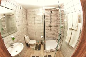 Et badeværelse på Комфортні апартаменти в Чернігові