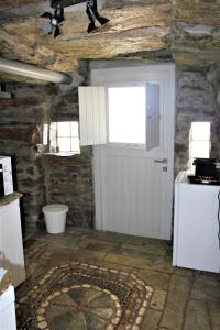 Kuchyň nebo kuchyňský kout v ubytování Gaia Vacation Home