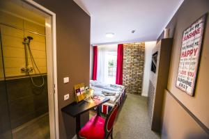 Postel nebo postele na pokoji v ubytování Hotel 4