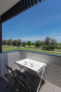 黑琵軼棧湖濱旅宿 K&B Happy Hostel陽台或露臺