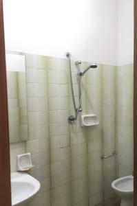 Koupelna v ubytování Hotel Floreale