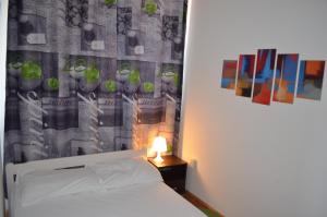 Posteľ alebo postele v izbe v ubytovaní Apartment Roxy