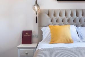 A bed or beds in a room at BIBLIOTHEQUE