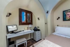 A bed or beds in a room at BIBLIOTHEQUE