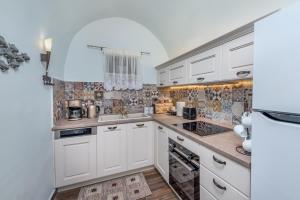 A kitchen or kitchenette at BIBLIOTHEQUE