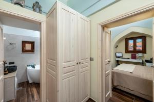 A bed or beds in a room at BIBLIOTHEQUE