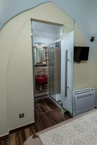 A bed or beds in a room at BIBLIOTHEQUE