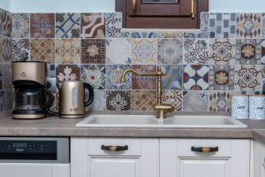A kitchen or kitchenette at BIBLIOTHEQUE