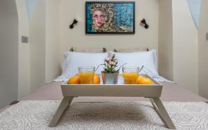 A bed or beds in a room at BIBLIOTHEQUE