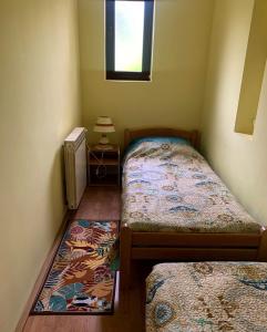 Łóżko lub łóżka w pokoju w obiekcie Apartman Belle Maison