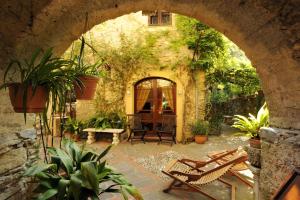 A garden outside Borgata Cantone Country House B&B