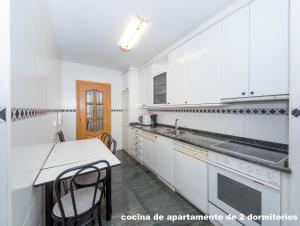 Kuchyňa alebo kuchynka v ubytovaní Gestión de Alojamientos Apartments