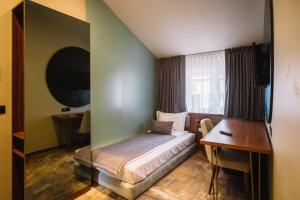 Un pat sau paturi într-o cameră la Vila Siago