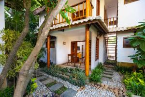 Zahrada ubytování Vila Coqueiros Boutique Hotel