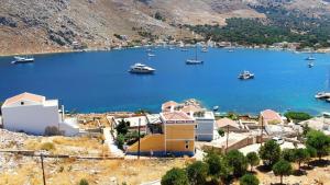 an aerial view of a harbor with boats in the water at Irene Double Apartment Katoi in Symi