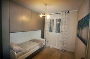 Ein Bett oder Betten in einem Zimmer der Unterkunft Porto San Rocco Italy Rental