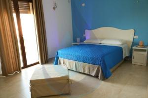 A bed or beds in a room at Acqua e Sale Avola