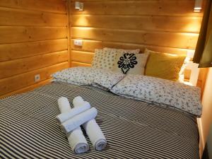 Posteľ alebo postele v izbe v ubytovaní Apartamenty Milka