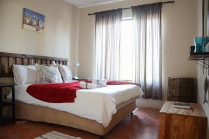 Letto o letti in una camera di Crayfish Creek