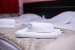 Letto o letti in una camera di Hotel Beograd - Yu