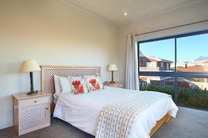 Giường trong phòng chung tại Sunset at Granula +10 ảnh