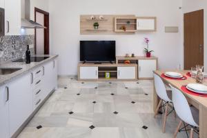 Kuchnia lub aneks kuchenny w obiekcie WintowinRentals All Comforts Málaga Center