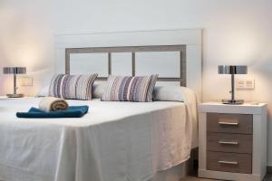 Posteľ alebo postele v izbe v ubytovaní WintowinRentals All Comforts Málaga Center