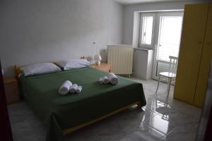 Кровать или кровати в номере La Quercia B&B +17 фотографий